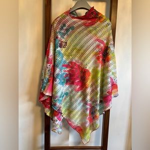 Before + Again crochet wrap, pastel floral pattern